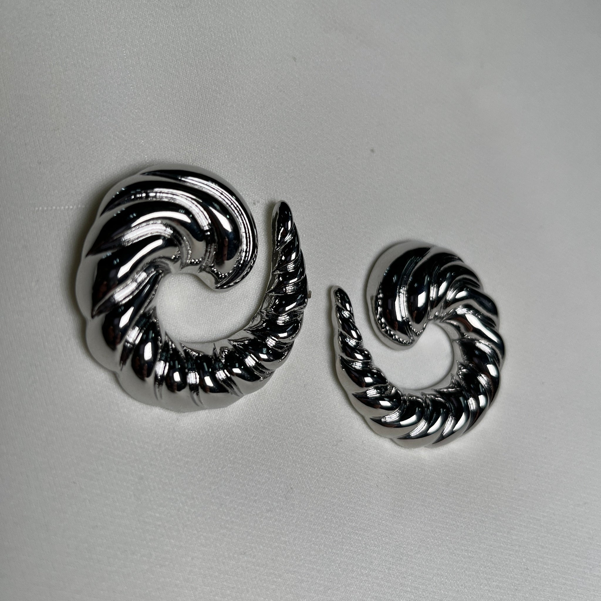Arete en forma de espiral plata