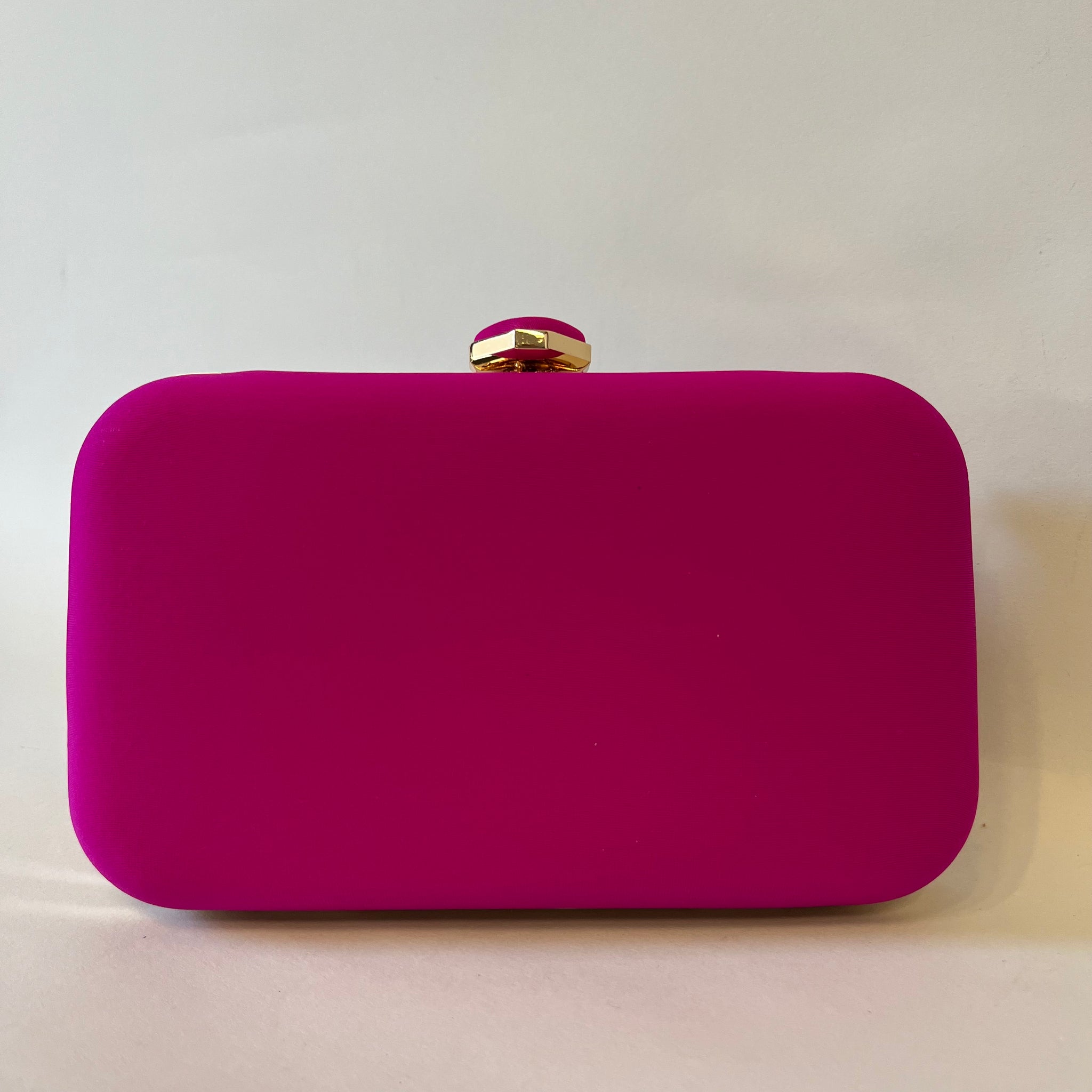 Clutch fucsia 2025