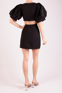 Vestido corto cut out con brillos negro