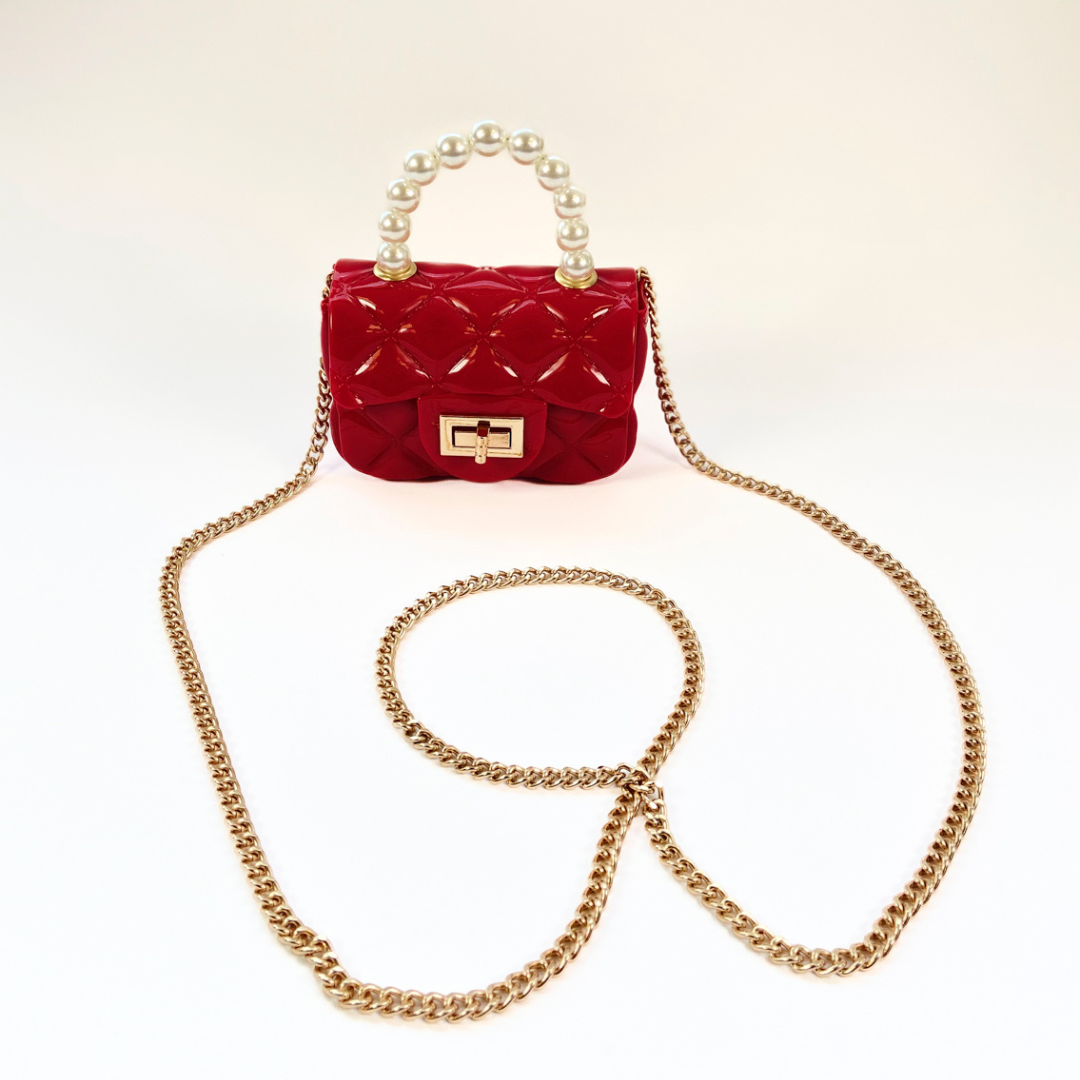 Mini bolsa roja con perlas
