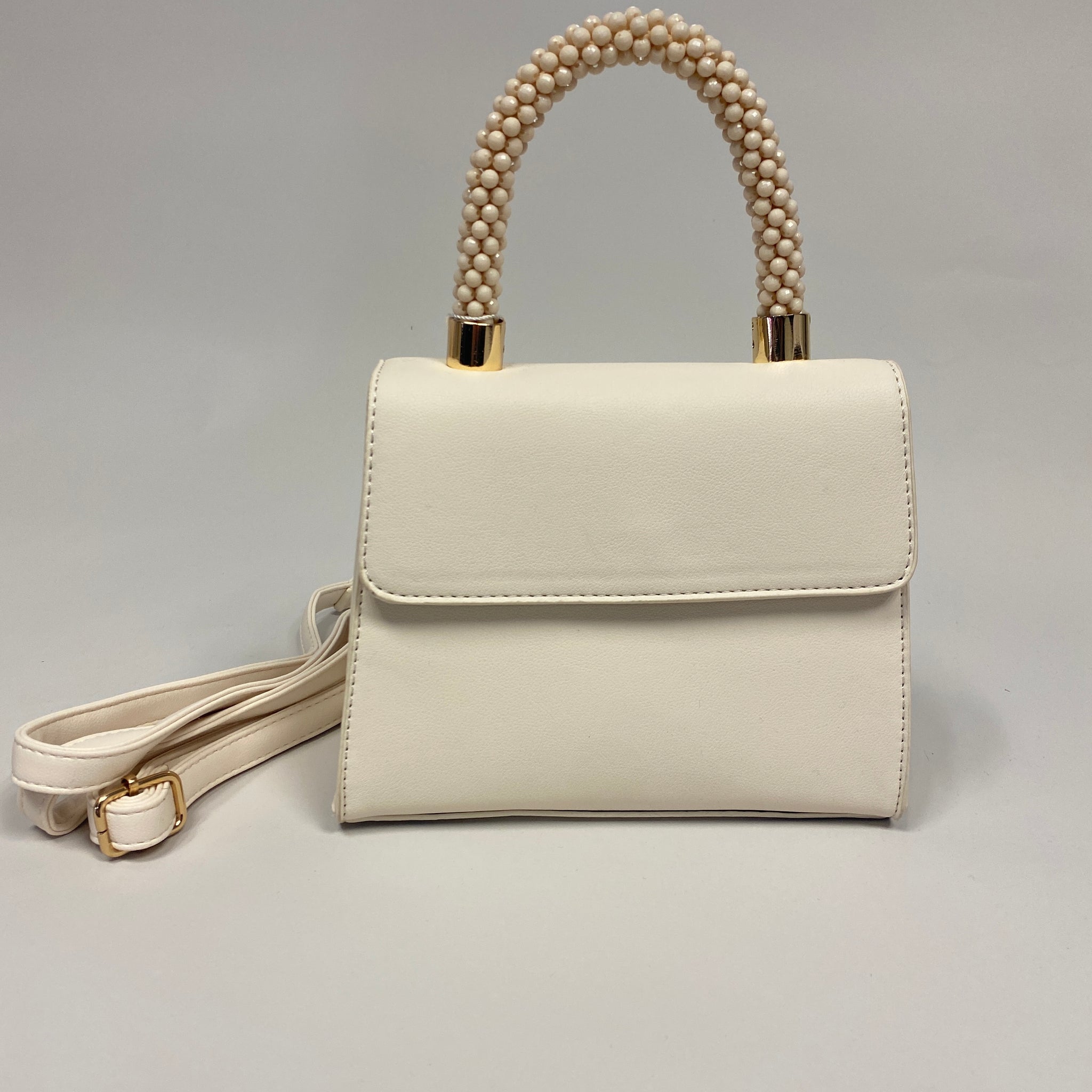 Bolsa cuentas crema