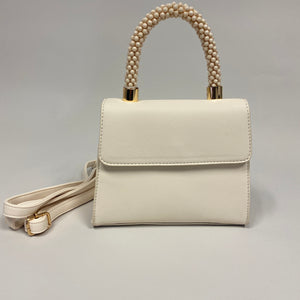 Bolsa cuentas crema