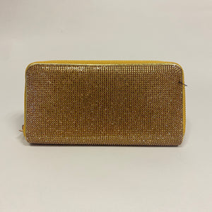 Cartera brillos dorada