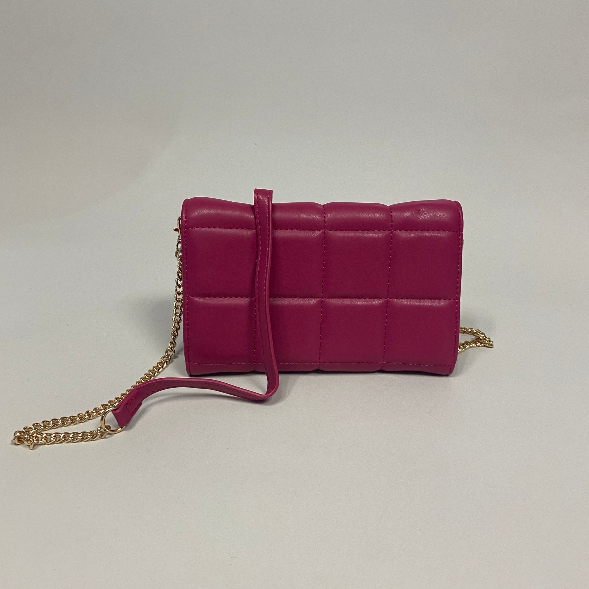 Bolsa capitonada magenta
