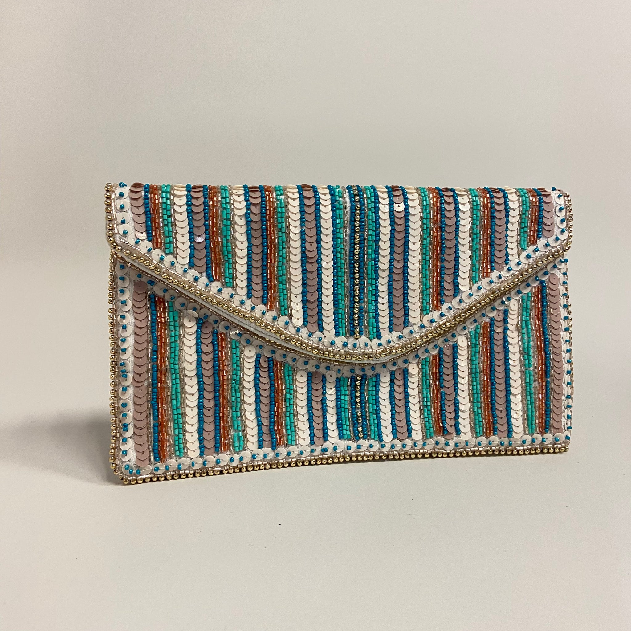 Clutch manta blanca bordada multi